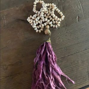 Like new long beaded tassel necklace